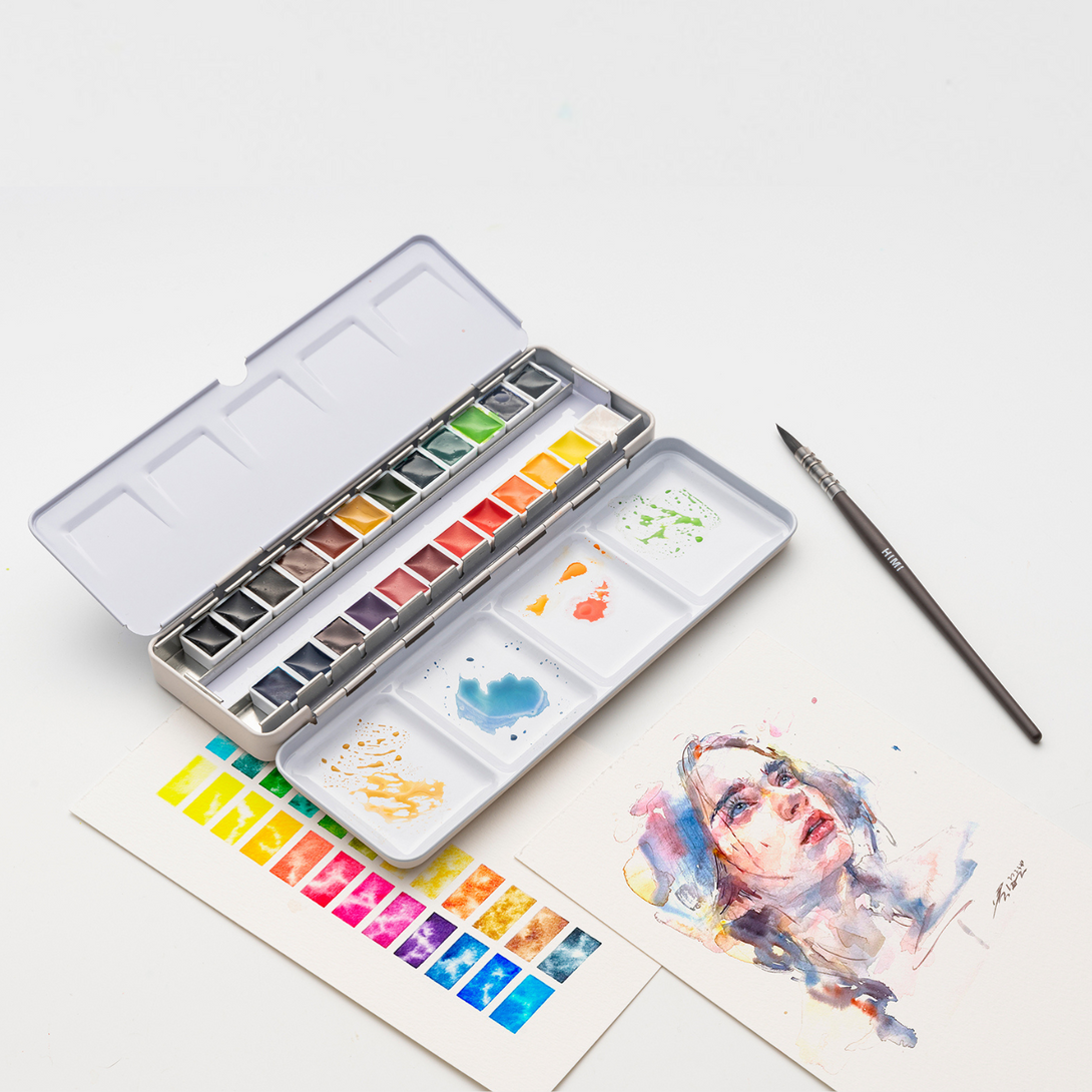 HIMI Watercolour Half Pan Set - 24 Colours with 1 Brush with watercolor painting.